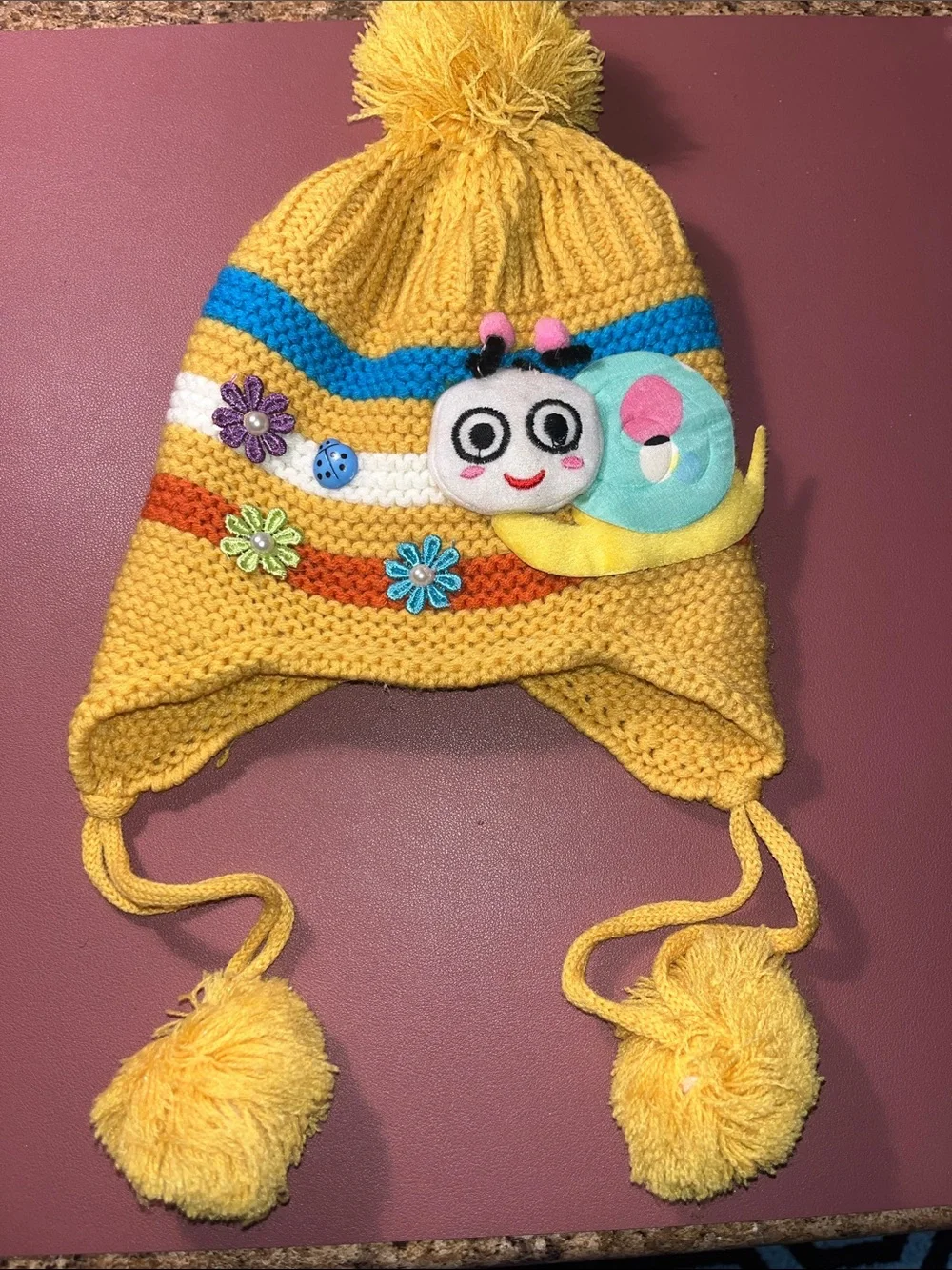Kids Plush Panda Earflap Hat - White and Pink and a yellow hat with a snail